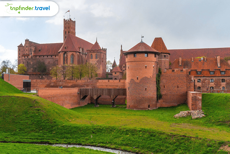 The Virgin Mary, the city's patroness, inspired the name of the largest Gothic fortress in Europe, which is situated in the mediaeval town of Malbork, also called Marienburg in German. | Poland Tourist Visa From UAE